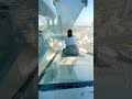 Sliding down a glass slide from the top of a skyscraper! 😮🫣  -  🎥 BVIRAL / preety_qummie