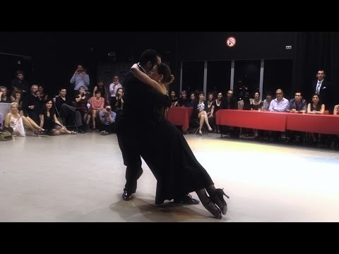  Ezequiel Paludi  and  Geraldine Rojas  are  dancing  to  a  tango  at  Antwerpen Tango Festival  in  2015