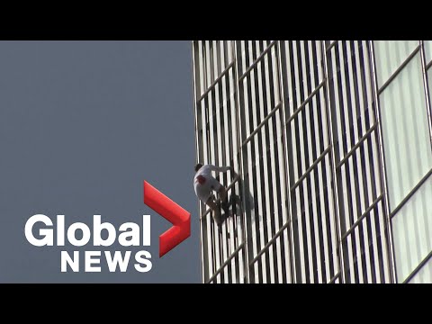 Daredevil free climber scales one of Europe's highest skyscrapers