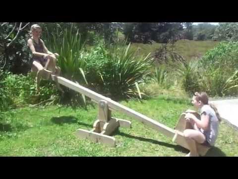Seesaw with sliding seats