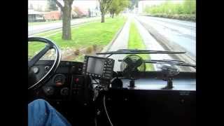 An articulated bus under automated steering control on EmX Route at Eugene, OR