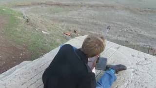 preview picture of video 'The Golan Heights - Tal Saki, Israel: a young man shoots on Syria with heavy machine gun'
