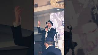 The Geula Season is Upon Us 🍷🫓🥬 (הזמר והיוצר שמחה יעקבי) - התמונה מוצגת ישירות מתוך אתר האינטרנט יוטיוב. זכויות היוצרים בתמונה שייכות ליוצרה. קישור קרדיט למקור התוכן נמצא בתוך דף הסרטון