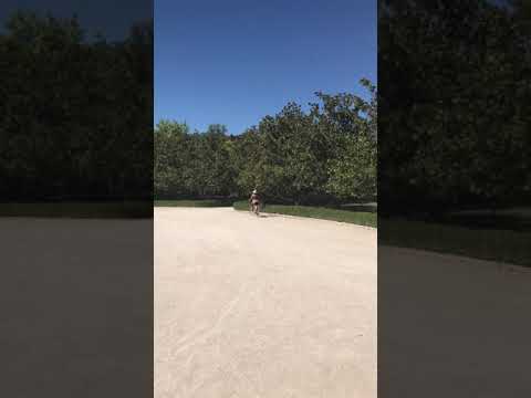 Riding a bike at Retiro Park