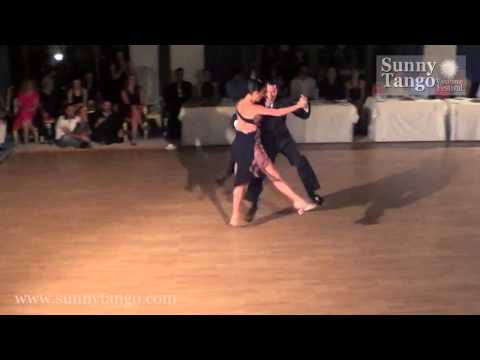 Miguel Angel Zotto  and  Daiana Guspero  are  dancing  to  the  milonga  "  Reliquias Porteñas  "  by  Francisco Canaro  at  Sunny Tango Festival  in  2013
