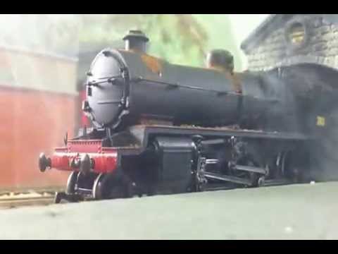 Rusting Woolwich Mogul making steam in Blackcut Shed.