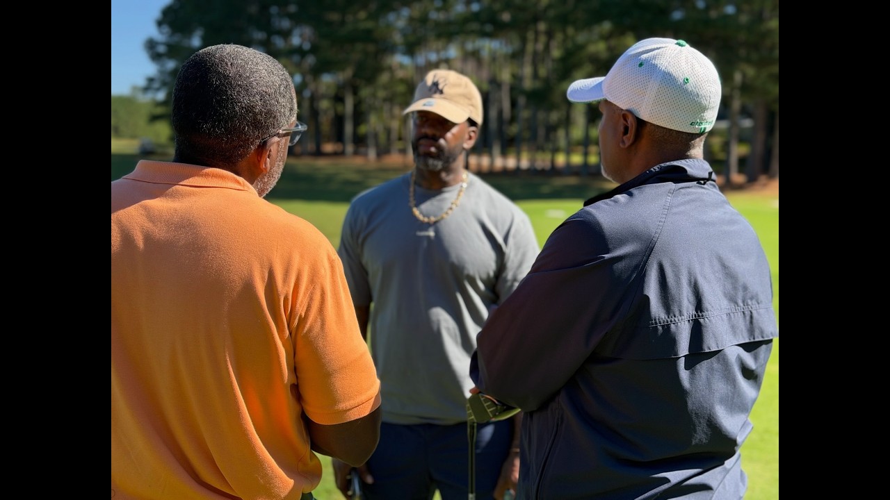 Mr. Mitchell takes Bone golfing!