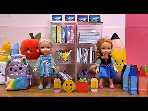 New backpacks! Elsa & Anna toddlers - shopping for school supplies - Barbie dolls