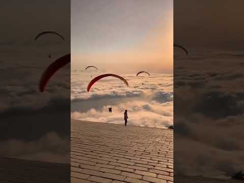 Jumping through sun soaked clouds 🤤 | paragliding