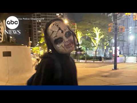 Manhunt underway for masked man menacing Philadelphia pedestrians