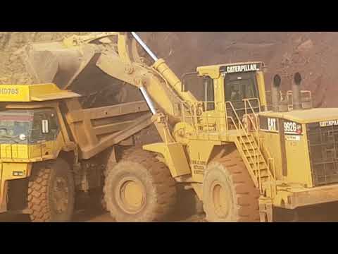 Caterpillar 992G Wheel Loader Loading Komatsu Dumpers