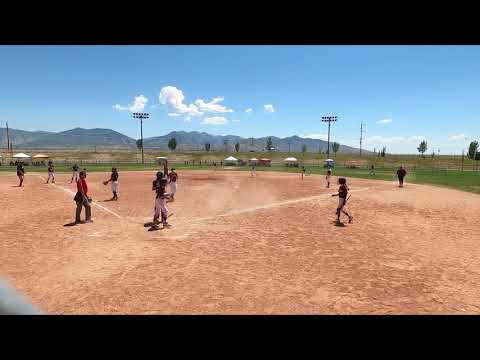OCBB Jenna Bunting, ends up at third base.