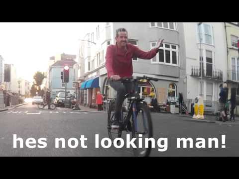 Overtakes cyclist then instantly turns left - idiot!