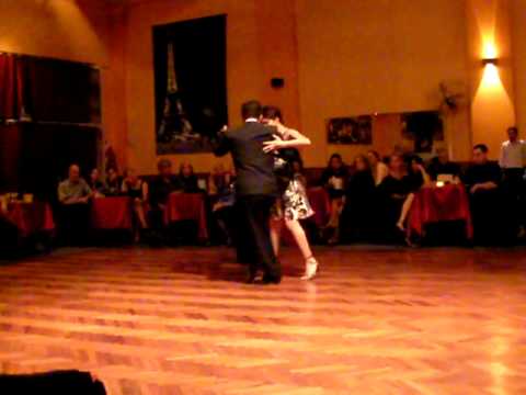  Samantha Dispari  and  Cristhian Sosa  are  dancing  to  a  tango
