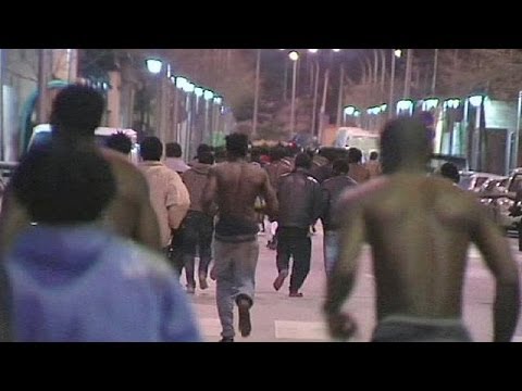 African migrants storm border into Spain's Melilla