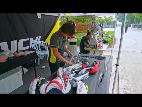 2019 ARRC Rd 6 Sepang, Malaysia Day 2 (Part 2/3) - RS Taichi booth fixing a racing suit