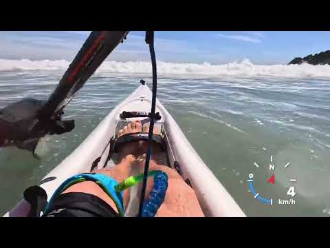 Paddling through shore break