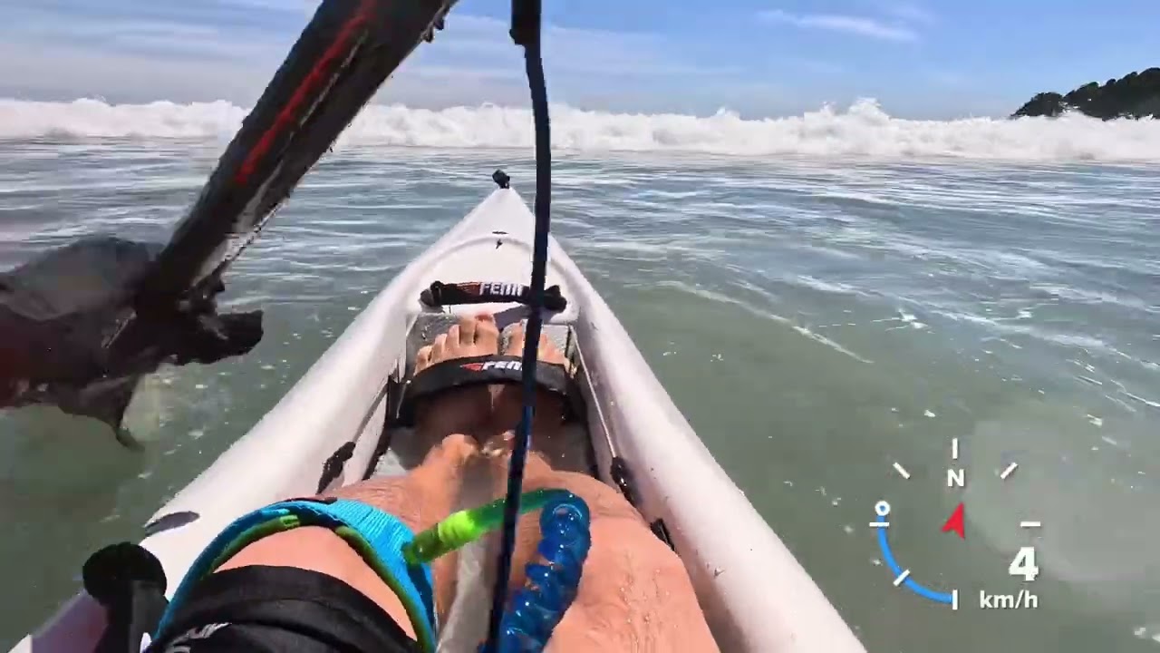 Paddling through shore break