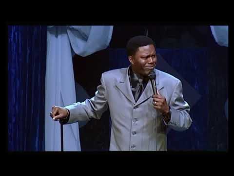 Bernie Mac breaks a microphone