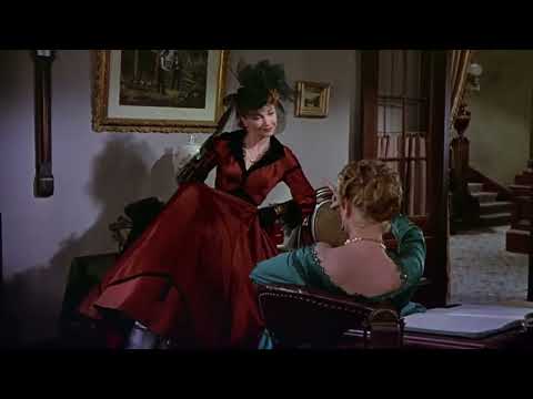 Anne Baxter sitting - Three Violent People (1956)