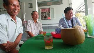 Meeting to discuss bridge construction plans, people happily treated themselves to delicious coco...