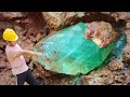 Diamonds and emeralds emerge from crevices in rocks after torrential rain