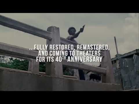 Trailer shot of Kingston dancehall energy that cues songs like 'Sweet and Dandy' and 'Pressure Drop'