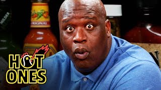 Hot Ones - Shaq Tries to Not Make a Face While Eating Spicy Wings