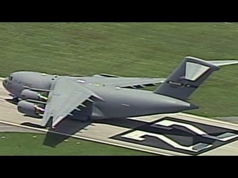 Cargo plane nails short runway landing