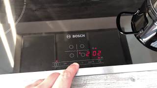 Induktionskochfeld bedienen mit metallischem Kochgeschirr Bosch autarkes Einbau Ceranfeld Anleitung