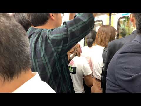 Crowded trains during rush hour in Tokyo, Japan
