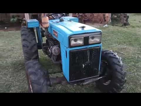 Trator importado Benye 254 4x4 tração blindada com tomada de potência econômica ano 1994..