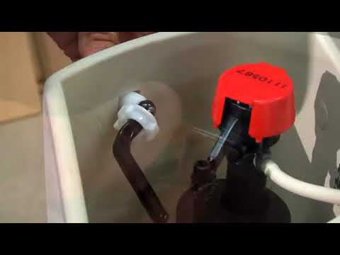 Part of a video titled How Do I Replace a Side Mount Toilet Tank Lever? - YouTube