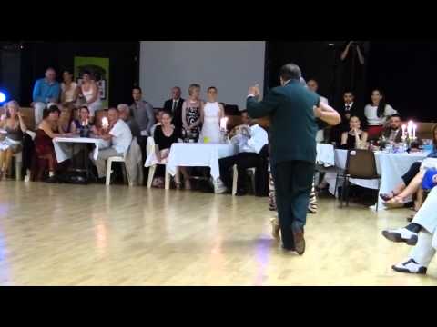  María del Carmen Romero  and  Jorge Dispari  are  dancing  to  a  tango