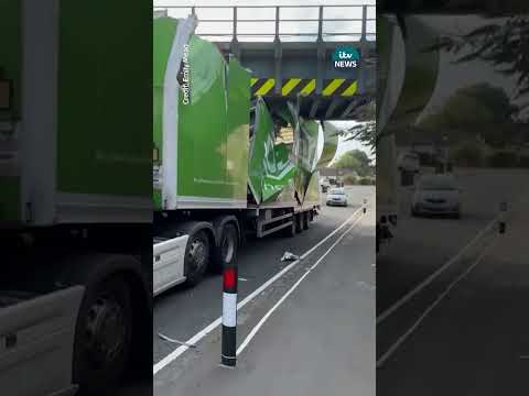 Lorry becomes wedged underneath railway bridge