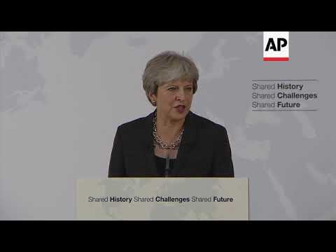 May: EU citizens' post-Brexit rights guaranteed