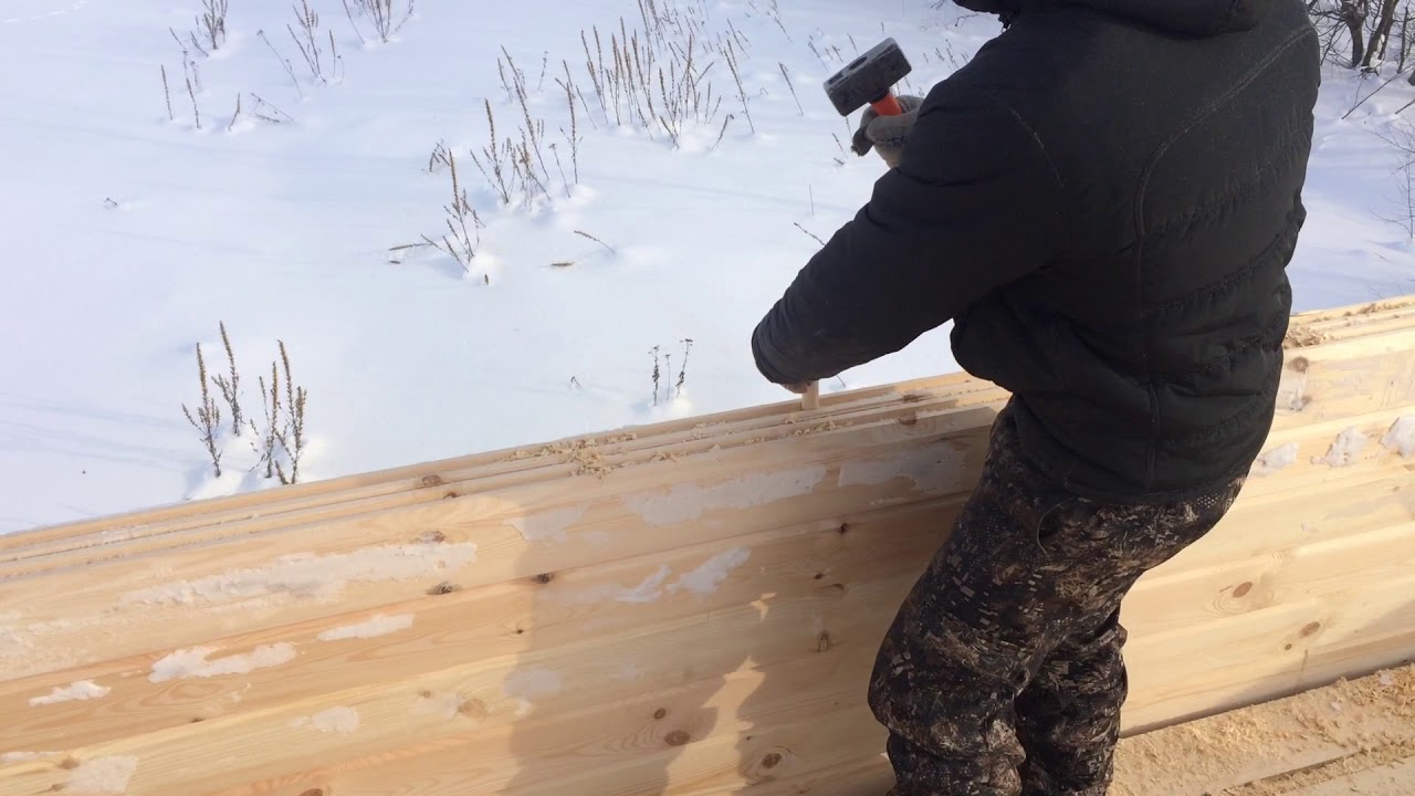 Крепление венцов сруба между собой деревянными нагелями