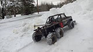 Redcat Gen8 plowing snow.
