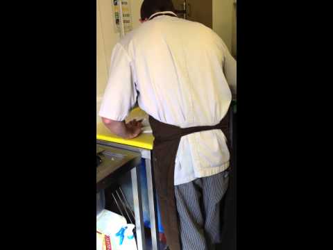 commis finely chopping flour