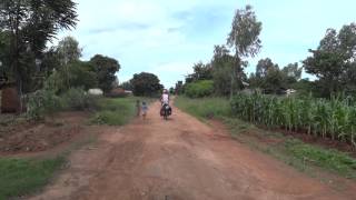preview picture of video 'Malawi, cycling on lovely tertiary sand roads, surrounded by happy children'