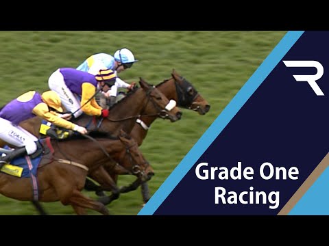 HARDY EUSTACE holds off Harchibald and Paul Carberry to retain his crown in the 2005 Champion Hurdle