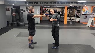 How To Defend A Gun Threat | Front Two Handed Cupping Technique