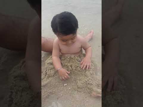 Baby shakeel swim on the beach