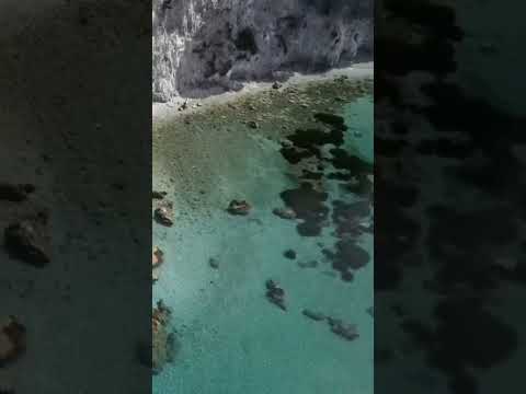 Serenity Unleashed:Sea Waves on Mountain Beach"Hashtags#SeasideSerenity#OceanMountains#NaturalBeauty