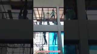 ใส่กระจกเท็มเปอร์นิรภัย โถงชั้น2