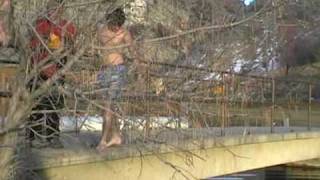 preview picture of video 'TRAVIS AND JASON SWIM IN NEAR FROZEN RIVER, UTAH'