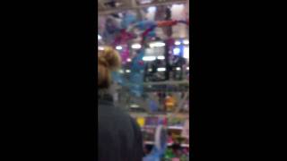 Emily Osment Rides a Tricycle in Wal-Mart - Novembre 2010