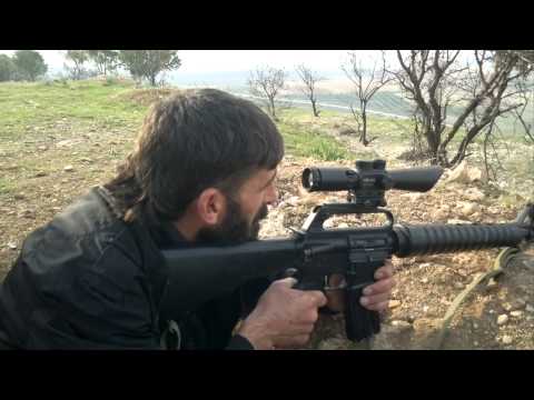 تمركز عناصر لواء الغضب في قرية عسيلة في ريف الرستن