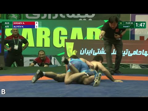 Round 1 FS - 65 kg: H. ALIYEV (AZE) df. A. GOGAEV (RUS), 2-1