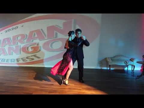  Alejandra Hobert  and  Adrian Veredice  are  dancing  to  the  tango  "  Adios Coco  "  by  Juan D'Arienzo